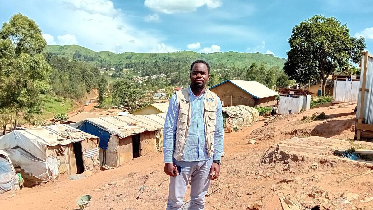 Julien Muyisa Mapilanga, who works for Trócaire in DRC, at a displacement camp for people who have had to flee their homes because of conflict. Picture: Trócaire Julien Muyisa Mapilanga, who works for Trócaire in DRC, at a displacement camp for people who have had to flee their homes because of conflict. Picture: Trócaire