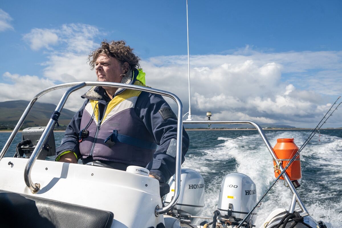 Captain John guides the boat through slightly choppy waters in Tralee Bay, Co Kerry, during a wildlife monitoring trip with marine filmmaker Ken O’Sullivan. Picture: Chani Anderson Captain John guides the boat through slightly choppy waters in Tralee Bay, Co Kerry, during a wildlife monitoring trip with marine filmmaker Ken O’Sullivan. Picture: Chani Anderson
