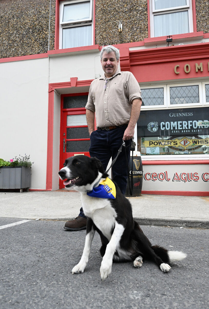 Kieran McGann with his dog Bella enjoying a walk and coffee at The Yard at Comerford's Bar in the village of Doonbeg. Kieran McGann with his dog Bella enjoying a walk and coffee at The Yard at Comerford's Bar in the village of Doonbeg.