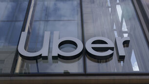 <p>FILE - An Uber sign is displayed at the company's headquarters in San Francisco, Sept. 12, 2022. (AP Photo/Jeff Chiu, File)</p> <p>FILE - An Uber sign is displayed at the company's headquarters in San Francisco, Sept. 12, 2022. (AP Photo/Jeff Chiu, File)</p>