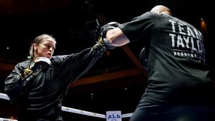 <p>ONCE UPON A TIME: Katie Taylor with her coach Ross Enamait. Pic: ©INPHO/Gary Carr</p>