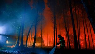 <p>A forest fire in Luglon in Landes, France last month. Fuelled by exceptionally warm tropical seas, El Nino may result in elevated temperatures but also high-power winter storms. Picture: Romain Perrocheau/AFP/Getty</p>
