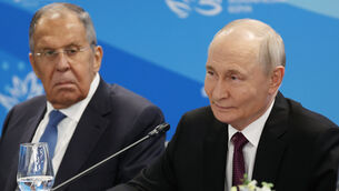 Russia’s foreign minister Sergei Lavrov, left, with the country’s president, Vladimir Putin (Vyacheslav Prokofyev/Sputnik, Kremlin Pool Photo via AP)