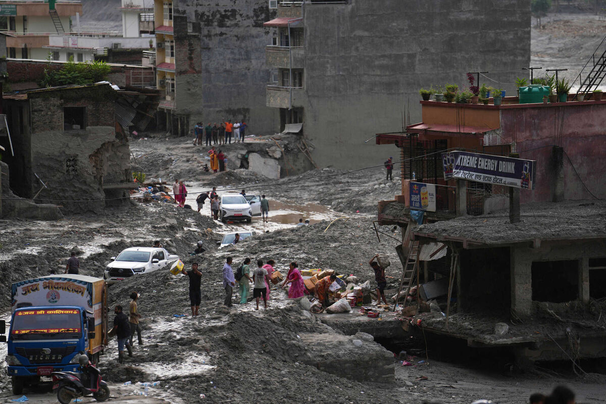 People salvage their belongings from a building damaged by flash flooding in Nuwakot district of Nepal, Tuesday, Sept. 1, 2026. (AP Photo/Rajesh Kumar Singh) People salvage their belongings from a building damaged by flash flooding in Nuwakot district of Nepal, Tuesday, Sept. 1, 2026. (AP Photo/Rajesh Kumar Singh)