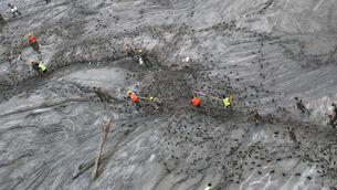 <p>A drone view shows rescue workers inspecting damaged structures amid sludge, debris and landslides in the aftermath of flash flooding along the Trishuli River in the Devighat area of Nepal's Nuwakot district, Saturday, Aug. 29, 2026. (AP Photo/Rajesh Kumar Singh)</p> <p>A drone view shows rescue workers inspecting damaged structures amid sludge, debris and landslides in the aftermath of flash flooding along the Trishuli River in the Devighat area of Nepal's Nuwakot district, Saturday, Aug. 29, 2026. (AP Photo/Rajesh Kumar Singh)</p>