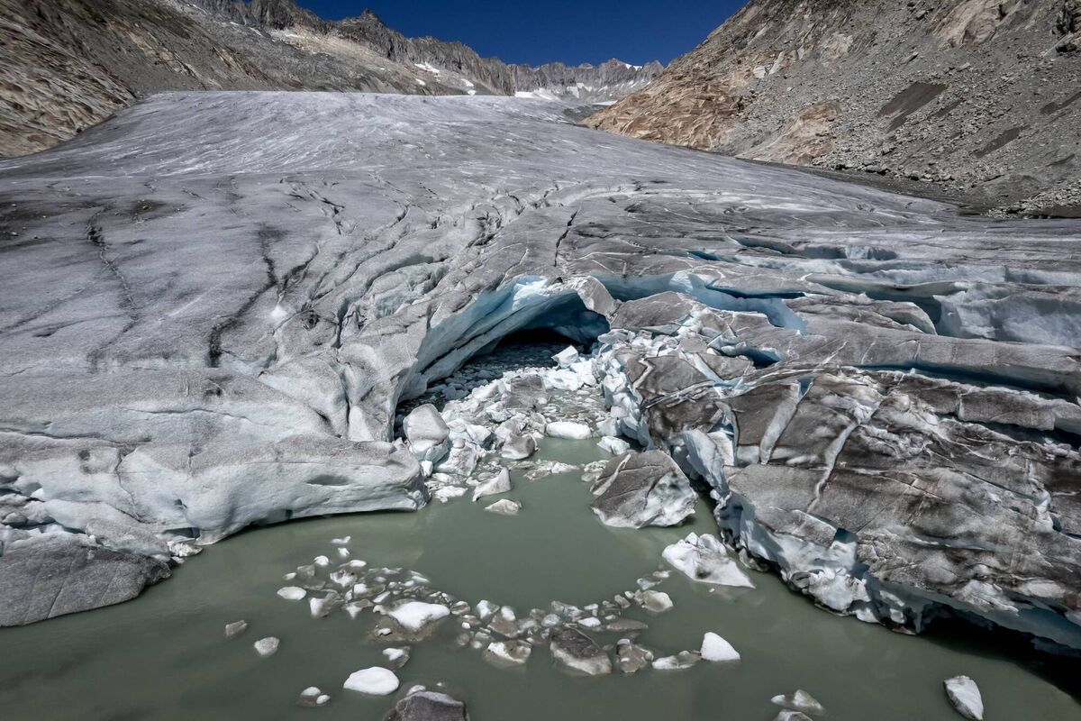 The melting Rhone Glacier, above Gletsch, in the Swiss Alps. After the extreme heat of June and July, it lost more than 4m of ice in a single month, according to glaciologist Matthias Huss. Picture: Fabrice Coffrini/AFP via Getty Images The melting Rhone Glacier, above Gletsch, in the Swiss Alps. After the extreme heat of June and July, it lost more than 4m of ice in a single month, according to glaciologist Matthias Huss. Picture: Fabrice Coffrini/AFP via Getty Images