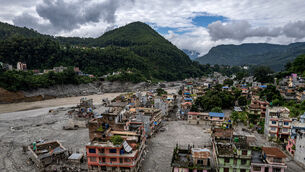 A drone view shows a damaged residential building along the swollen Trishuli River in the aftermath of flash floods in Nepal’s Nuwakot district (Rajesh Kumar Singh/AP) A drone view shows a damaged residential building along the swollen Trishuli River in the aftermath of flash floods in Nepal’s Nuwakot district (Rajesh Kumar Singh/AP)