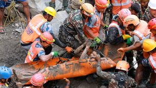 <p>A survivor is carried out after being rescued from inside the tunnel. Photo: Nepal Army/Reuters</p> <p>A survivor is carried out after being rescued from inside the tunnel. Photo: Nepal Army/Reuters</p>