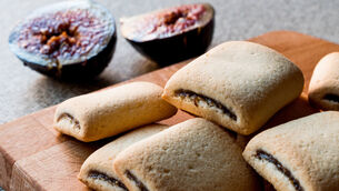 <p> Fig Cookies with fruits on wooden surface. Organic Food.</p>