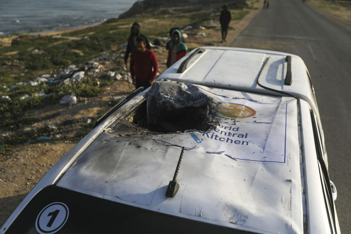 Palestinians inspect a vehicle with the logo of the World Central Kitchen wrecked by an Israeli airstrike in Deir al Balah, Gaza Strip, Tuesday, April 2, 2024. (AP Photo/Ismael Abu Dayyah) Palestinians inspect a vehicle with the logo of the World Central Kitchen wrecked by an Israeli airstrike in Deir al Balah, Gaza Strip, Tuesday, April 2, 2024. (AP Photo/Ismael Abu Dayyah)