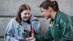 <p>Young fan Leanne meets Katie Taylor after the weight in. Picture: ©INPHO/James Crombie</p>