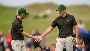 <p>Connor Graham, left, and Tyler Weaver of Great Britain and Ireland during the foursomes matches on day one of the 51st Walker Cup at Lahinch. Pic: Ramsey Cardy/Sportsfile</p>