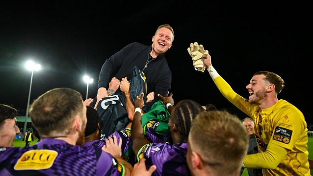<p>Cork City manager Barry Robson is held aloft in the celebrations following their First Division promotion. Pic: Piaras Ó Mídheach/Sportsfile</p>