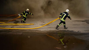 <p>Firefighters try to extinguish a fire at a destroyed warehouse after Russian drone attacks on the outskirts of Kyiv, Ukraine, Friday, Aug. 28, 2026. (AP Photo/Francisco Seco)</p>