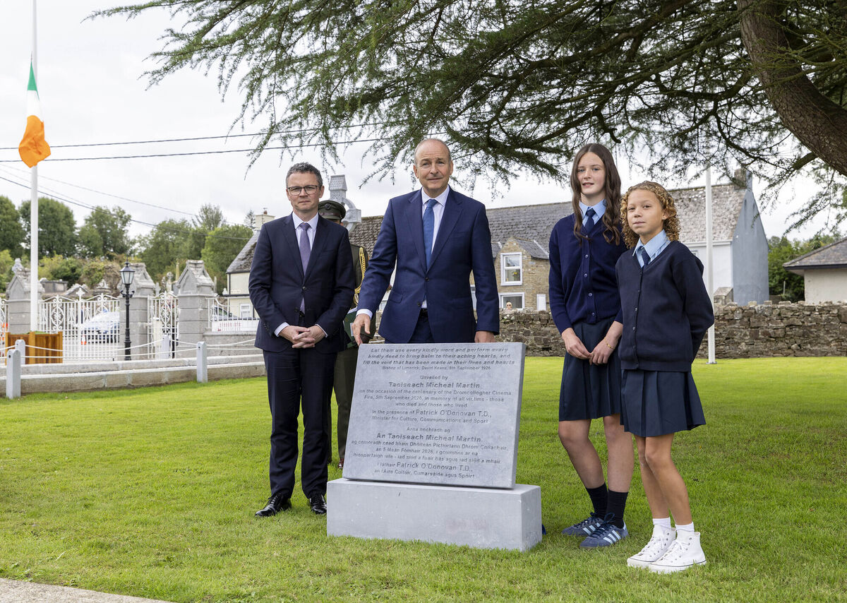 Pictured unveiling the plaque with Taoiseach Micheál Martin and culture minister Patrick O'Donovan was 6th class students Sadie Scollard and Amelia Nix. Picture: Arthur Ellis