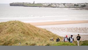 <p>Stuart Grehan of Great Britain and Ireland makes his way to the 8th green at Lahinch Golf Club. Pic: Ramsey Cardy/Sportsfile</p>
