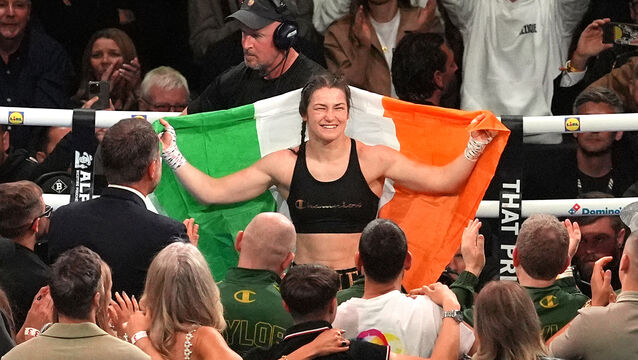 <p>Katie Taylor celebrates after the victory in her final professional bout before retirement at Croke Park.</p>