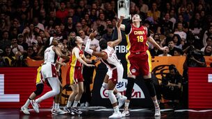 <p>CHECK: China's giant centre Zhang Ziyu tries to block USA forward Napheesa Collier in their FIBA Women's World Cup Group D game in Berlin. Pic: John MacDougall, AFP via Getty Images</p> <p>CHECK: China's giant centre Zhang Ziyu tries to block USA forward Napheesa Collier in their FIBA Women's World Cup Group D game in Berlin. Pic: John MacDougall, AFP via Getty Images</p>