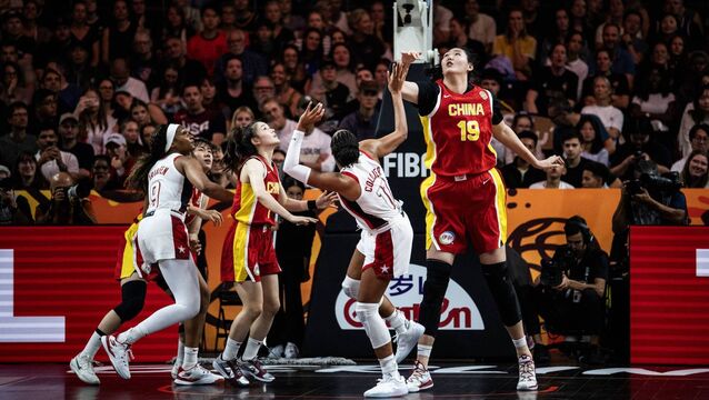 <p>CHECK: China's giant centre Zhang Ziyu tries to block USA forward Napheesa Collier in their FIBA Women's World Cup Group D game in Berlin. Pic: John MacDougall, AFP via Getty Images</p>
