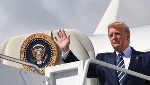 <p>US President Donald Trump waves as he disembarks Air Force One upon arrival at Shannon Airport in 2019. Pic: Mandel Ngan/AFP/Getty Images)</p>