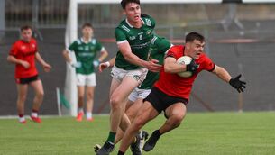 <p>Kenmare's Tom Murnane under pressure from Diarmuid Quirke of Milltown/Castlemaine in Saturday's Kerry Petroleum Club SFC quarter-final at the Fitzgerald Stadium. Pic: Tatyana McGough.</p>