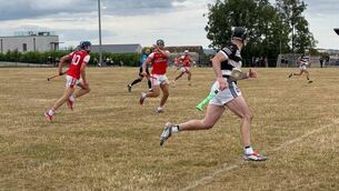 <p>Watergrasshill’s Ciaran O’Leary plays the ball to Adam Murphy during their Co-Op Superstores SAHC clash with Ballyhea at Kildorrery earlier in the campaign. Picture: Amy Allen</p>