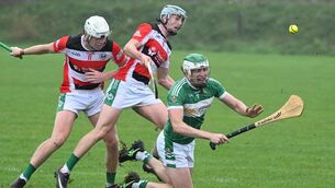 <p> Theo Morgan, Ballincollig puts pressure on Sean Furey, Aghabullogue. Picture: Larry Cummins</p>