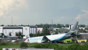An Amazon cargo plane sits at the Miami International Airport after it overshot the runway on Sunday (Lynne Sladky/AP)