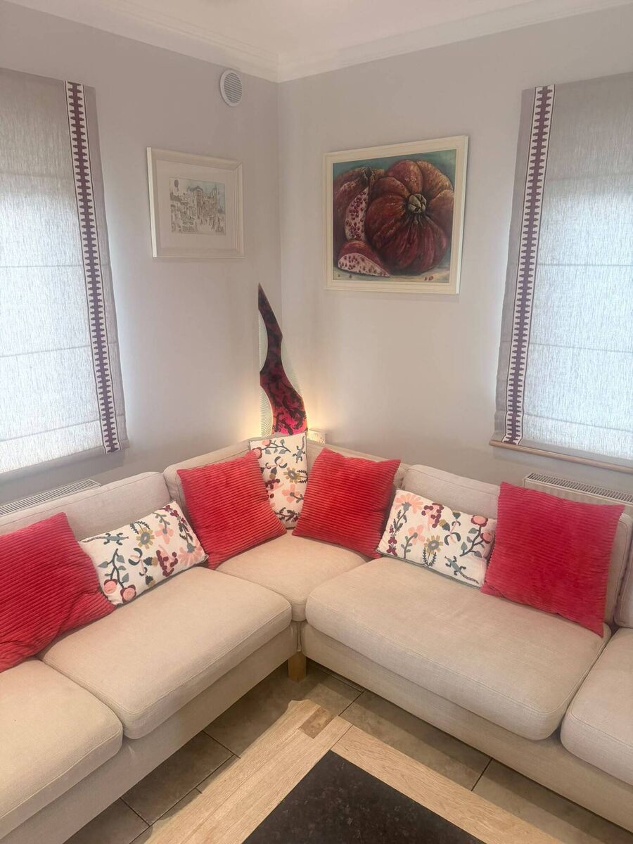 Rory's living room where a painting by his sister Roisin takes pride of place and a piece commissioned by his friends the Kellys from Dublin represents Rory and his wife Cheryl's lives together. Rory's living room where a painting by his sister Roisin takes pride of place and a piece commissioned by his friends the Kellys from Dublin represents Rory and his wife Cheryl's lives together.