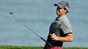 Early birdies elude McIlroy