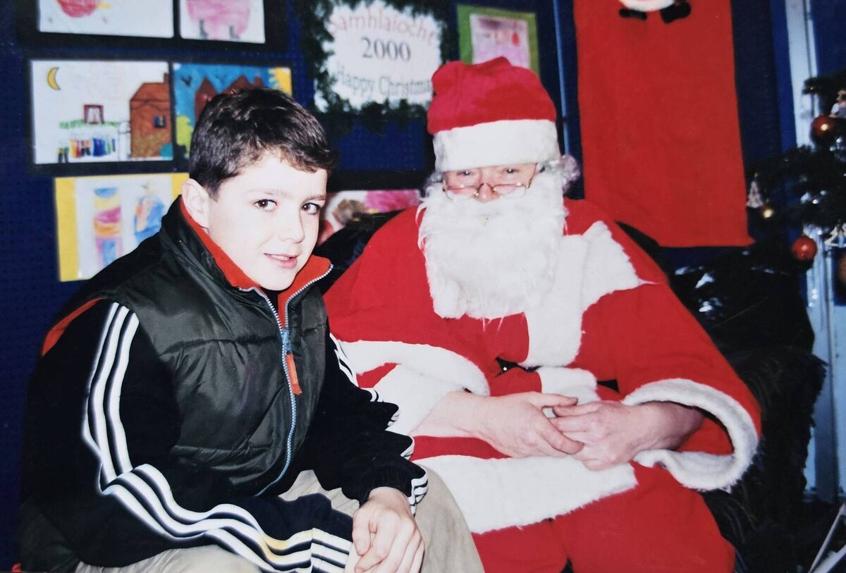 Casey visiting Santa in Tralee in December 2000. Age 10 Casey visiting Santa in Tralee in December 2000. Age 10