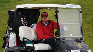 <p>US president Donald Trump on the 15th hole at Trump International Golf Links &amp; Hotel in Doonbeg, Co. Clare.</p>