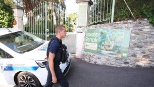 <p>A police officer passing in front of the entrance of the Musee Renoir after four paintings were stolen in an early-morning heist. (Photo by Valery HACHE / AFP via Getty Images)</p> <p>A police officer passing in front of the entrance of the Musee Renoir after four paintings were stolen in an early-morning heist. (Photo by Valery HACHE / AFP via Getty Images)</p>