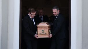 <p>Pall bearers carry the casket from the chapel after the funeral of Eoin Doyle at St. Patrick's Church in Cloonfad, Co Mayo. Photo: Clodagh Kilcoyne/PA Wire</p>