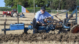 <p> Paddy Connolloy, Kildare fixing his plough in a practice session for the National Ploughing Championships at Ratheniska, Co Laois. Picture Dan Linehan</p>