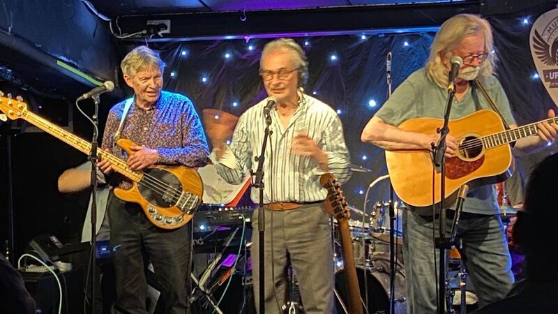 Jimmy MacCarthy on stage with band members Johnny Campbell and Declan Sinnott at the White Horse in Ballincollig in May 2026.  