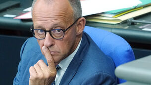 German Chancellor Friedrich Merz looks on during the general debate (Kay Nietfeld/dpa via AP)