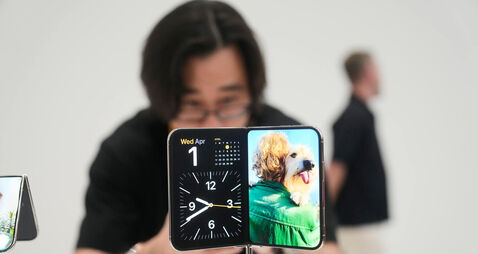 APTOPIX Apple iPhone