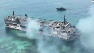The ferry caught fire off the western Philippines (Philippine Coast Guard via AP)