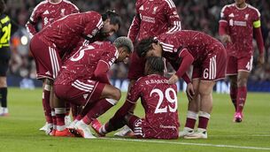 <p>NOTHING SERIOUS: Liverpool players check on teammate Bradley Barcola after he picked up an injury. Pic: Peter Byrne/PA Wire.</p>