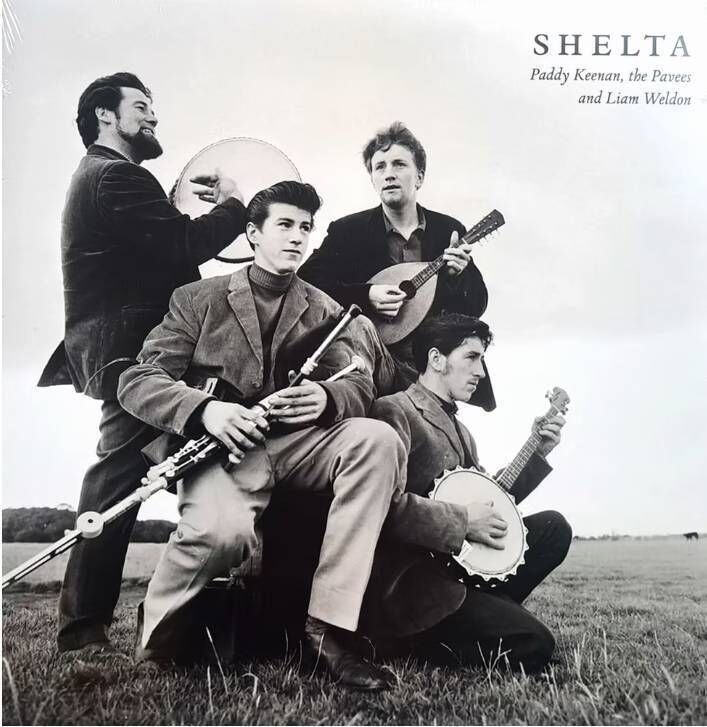 Paddy Keenan and other group members on the cover of the Shelta album. Paddy Keenan and other group members on the cover of the Shelta album.