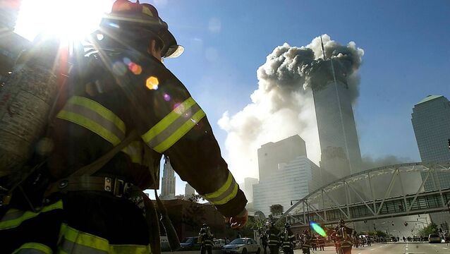 <p>Firefighters walking towards one of the towers at the World Trade Center before it collapsed on September 11, 2001. In the firefighter community, cancers are seen as an inevitability where young men got cancers that only older men got, or men got cancers that only women got. File photo: Jose Jimenez/Primera Hora/Getty Images</p>