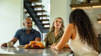 Dining Room Conversation with Mother Talking to Daughter While Father Listens