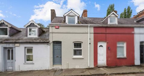Unassuming central city gem with stunning garden and fully renovated interior for €345k