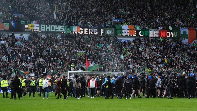 <p>Celtic and Rangers fans invade the pitch at full time, following the Scottish Gas Men's Scottish Cup quarter-final match at Ibrox Stadium, Glasgow. Picture date: Sunday March 8, 2026.</p>