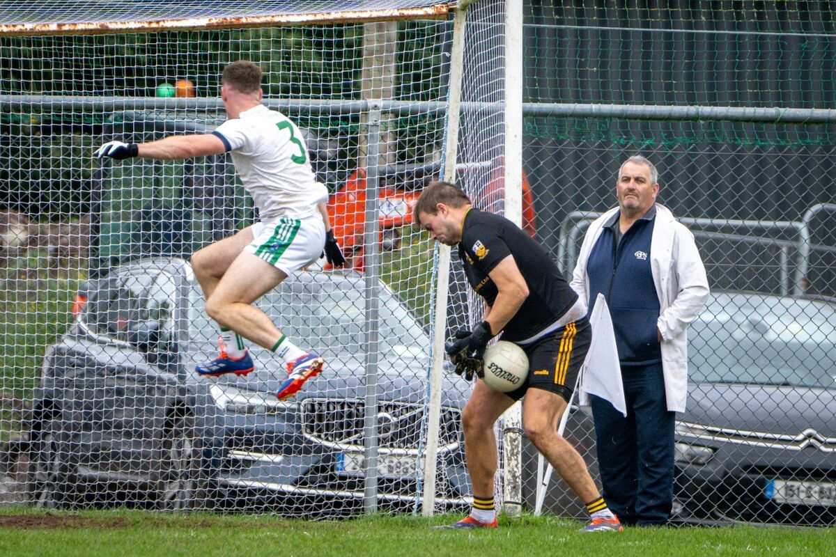 Buttevant’s Ronan Donovan saves a shot at goal by Ilen Rovers‘ Jack Collins. Pic: Chani Anderson