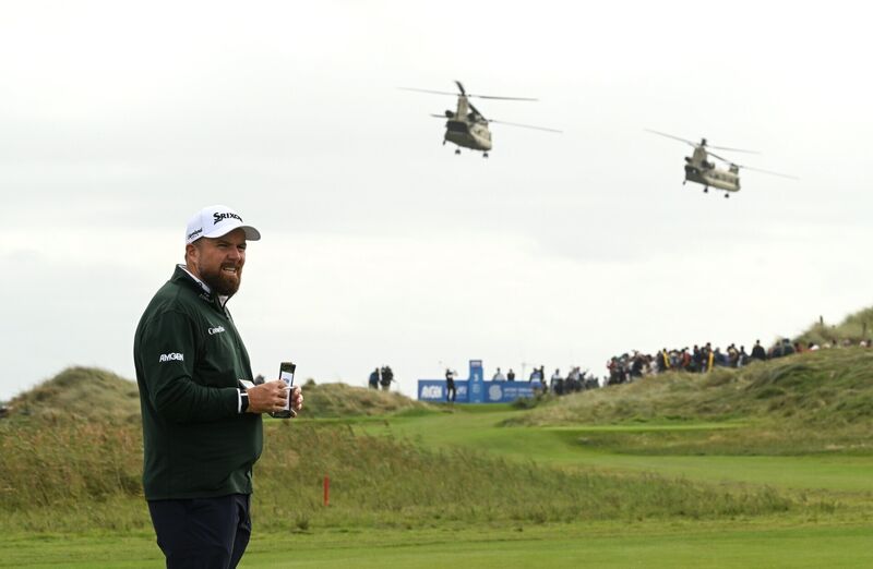Shane Lowry beside U.S. President Donald Trump arriving aboard Marine One. Pic: Ramsey Cardy/Sportsfile. Shane Lowry beside U.S. President Donald Trump arriving aboard Marine One. Pic: Ramsey Cardy/Sportsfile.