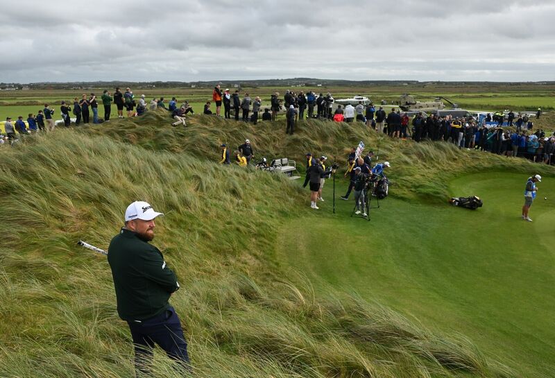 Shane Lowry prepares his shot onto the second green. Pic: Ramsey Cardy/Sportsfile. Shane Lowry prepares his shot onto the second green. Pic: Ramsey Cardy/Sportsfile.