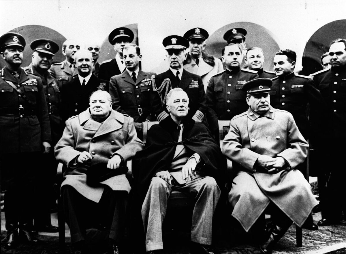 Winston Churchill, Franklin D Roosevelt, and Josef Stalin with their advisers at the Yalta Agreement talks in 1945. 