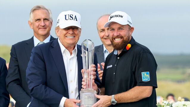<p>US president Donald Trump presents Shane Lowry with the Irish Open trophy. Picture: INPHO/Dan Clohessy</p>